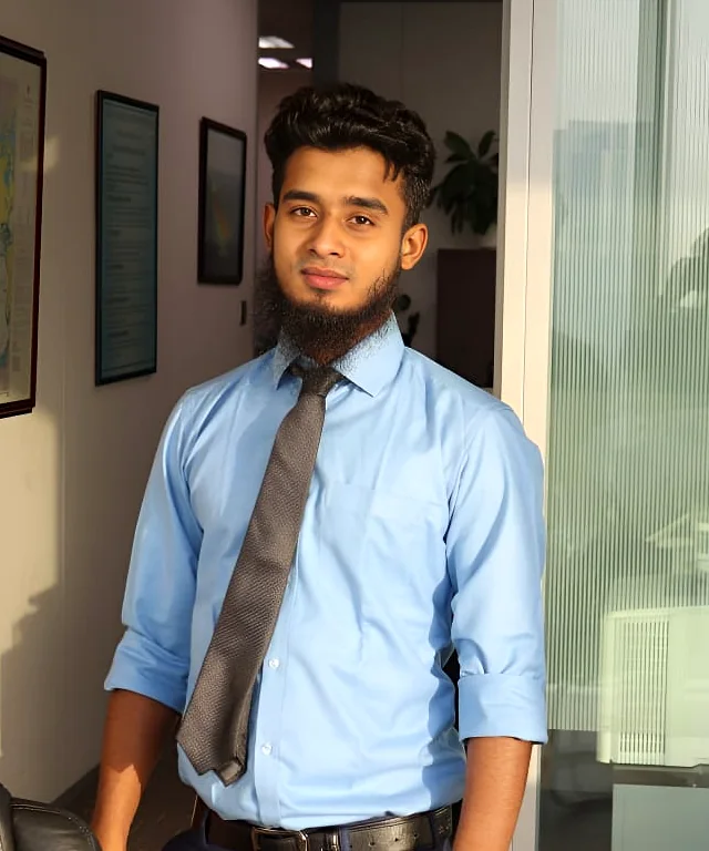 MD Sabbir Khan at work in a modern technology workspace